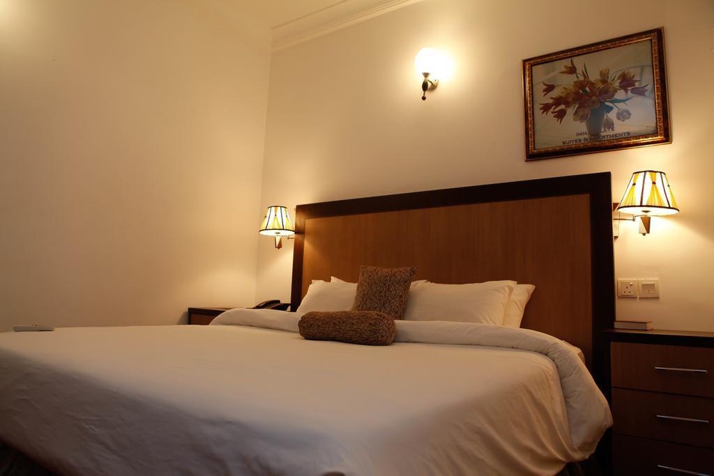 Immaculate Suites And Apartments Mobushipe Szoba fotó
